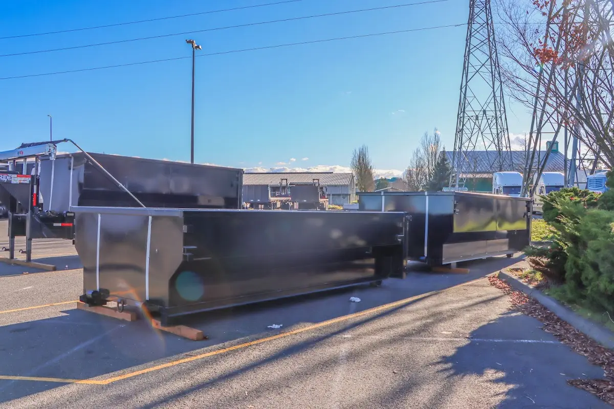 Roll-off dumpster ready for waste disposal at job site for Construction Dumpster Rental in Spearfish
